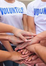 volunteers holding hands
